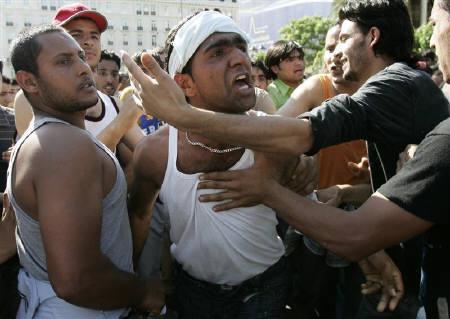 muslim-immigrant-shouts-slogans-during-a-rally-in-athens-may-22-2009